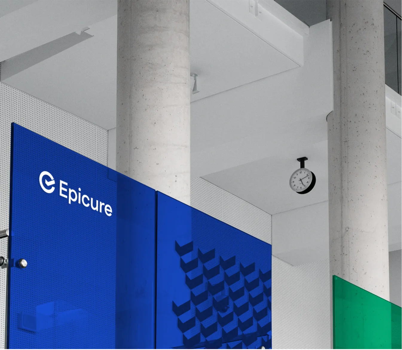 Epicure branded glass wall in an office atrium